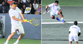 Sergi Bruguera of Mumbai Masters hits a backhand during his legends match against Punjab Marshalls Leander Paes ; Paes jumps across the net to comfort Tommy Robredo who got hit by the ball during their mixed doubles match in Chandigarh on Thursday.