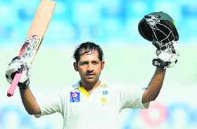 Pakistans Sarfraz Ahmed celebrates after scoring a century against New Zealand in the second Test in Dubai on Thursday.