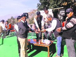 The chief guest inaugurates the seminar on social change and edcuation in Kandi Khal village on Thursday.