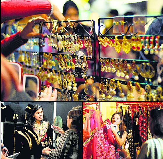 (Clockwise from top) Designer earrings on display; a girl looks at a traditional dress; and visitors try jewellery at Wedding Asia Exhibition in Ludhiana on Friday.