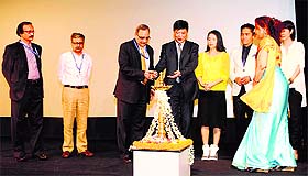 Tony Gang, Vice-Minister of State Admin of Press, Publication, Radio Film, China, and Bimal Julka, secretary, Ministry of Information and Broadcasting, at a function in Panjim. 