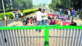 Protesting Punjabi University students in Patiala block the universitys main gate on Friday.