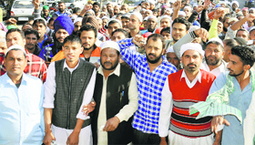 Alawalpur residents and members of the Punjab Muslim Front protest in Jalandhar on Friday.