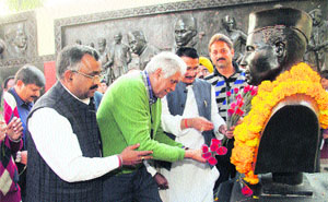 A delegation from South Africa pays homage to former Prime Minister Jawaharlal Nehru at the old jail in Dehradun on Friday.