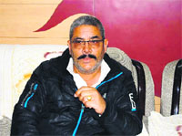 Manmohan Singh Mal, pressident, Municipal Corporation, Mussoorie, addresses mediapersons on Friday.