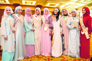 Finalists of the World Muslimah Awards pose for a photo while attending a galla dinner in Yogyakarta, Indonesia.