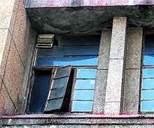 The broken windows and panes of a hospital in Amritsar