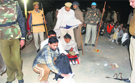Rampals private commandos in police custody at Barwala in Hisar district on Saturday.