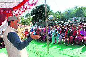 Chief Parliamentary Secretary ID Lakhanpal addresses a public meeting at Bhota in Hamirpur on Saturday.