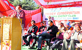 Industries Minister Mukesh Agnihotri addresses a gathering during the centenary celebrations of the middle school at Jari in Kullu on Saturday