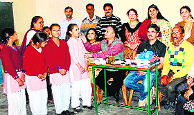 Schoolchildren being examined at a health check-up camp in Una on Saturday. 