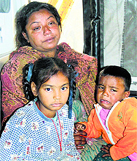 Wailing relatives of one of the youths Ravi, who died after being hit by a truck in Shahkot on Saturday