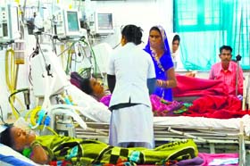 Patients recovering at a Bilaspur hospital after complications following sterilisation operations at a special camp. Sixteen women who underwent sterilisation in the camp died