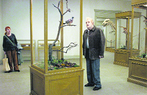 Still from Roy Anderssons A Pigeon Sat on a Branch Reflecting on Existence