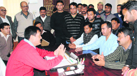 Members of the Bharatiya Janata Yuva Morcha submit a memorandum to the Chief Medical Officer in Dehradun on Saturday.