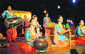 Students of the BBK DAV College for Women play folk instruments during the Youth Theatre Festival at Virsa Vihar in Amritsar on Sunday.