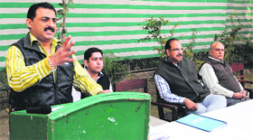 Rajesh Soi, president, Amritsar Chemists Association, addresses members at a meeting in Amritsar.