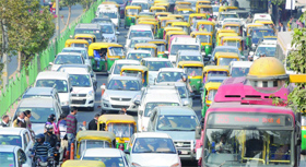 Delhiites face a heavy traffic jam on Mathura Road near Pragati Maidan due to IITF-2014 and Airtel Delhi Half Marathon on Sunday.