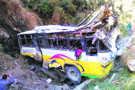 The ill-fated bus which met with an accident near Sail village in Haripurdhar area of Sirmaur district on Sunday