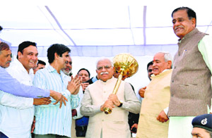 Chief Minister Manohar Lal (centre) during a function in Rewari on Sunday.