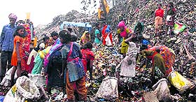 Children at a garbage dump in Jalandhar. 
