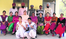 Students of Government Senior Secondary School with their medals