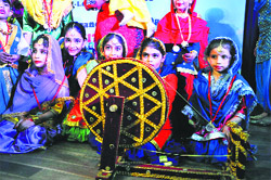 Students of Whizkidz Play School present an item during the annual function at Guru Nanak Bhawan in Ludhiana. 