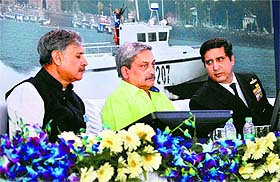 Defence Minister Manohar Parrikar with Minister of State for Defence Rao Inderjit Singh (left) and Naval Chief Admiral RK Dhowan in Gurgaon on Sunday. 