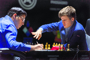 Carlsen beats Anand in the 11th game to win the match with a 6.5-4.5 scoreline and retain the world title he won last year in Chennai