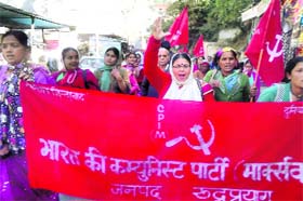 CPM activists take out a march in Rudraprayag district on Sunday