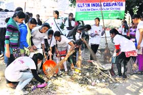 Students take part in a cleanliness drive at Gandhi Park