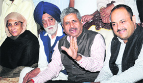 MLA Sarup Chand Singla interacts with media persons during a press conference in Bathinda on Monday. 
