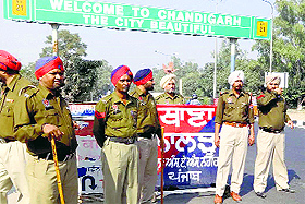 Punjab Police personnel deployed at a naka on the Chandigarh-Ambala highway at the UT border in Zirakpur. 
