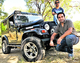 Kabir Waraich (in grey shirt) along with his co-driver Gurmeet Virdi. 