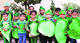 Students celebrate Green Day at Golden Bells Public School in Mohali on Monday.