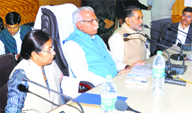 Chief Minister Manohar Lal Khattar addresses a meeting of officers in Narnaul on Monday. Education Minister Ram Bilas Sharma (extreme right) is also present.