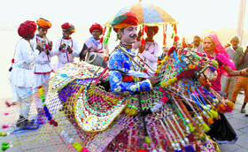 Artistes perform during the inauguration ceremony of the Craft Mela and Saras Mela at Brahmasarovar in Kurukshetra on Monday.