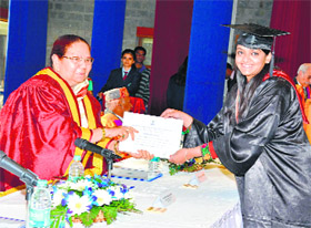 Governor Urmila Singh confers a degree on a girl at a convocation at Jaypee University in Waknaghat on Monday