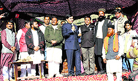 BJP leader Shahnawaz Hussain addresses a rally in Poonch.