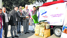 Governor NN Vohra flags off relief materials for flood victims from Raj Bhawan in Jammu on Monday. 