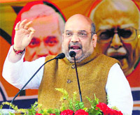 BJP president Amit Shah addresses an election meeting in Adityapur in Jharkhand on Monday