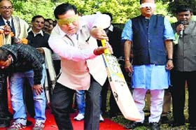Sports Minister Sarbananda Sonowal plays blindfolded to get a feel of blind cricket
