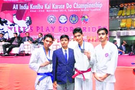 The winners during the All-India Karate Championship at the Talkatora Stadium in Delhi