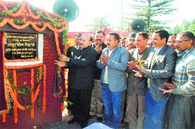 Health and Revenue Minister Kaul Singh Thakur lays the foundation stone of a building of a school at Thaltookhor in Mandi on Tuesday
