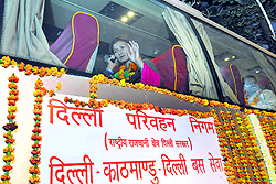 The Kathmandu-bound bus leaves the Ambedkar bus terminal after being flagged off, in New Delhi on Tuesday