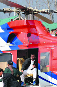 Congress vice-president Rahul Gandhi shakes hands with a supporter during an election rally at Lolab on Tuesday.