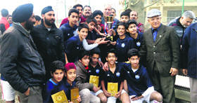 The winning team of Tyndale Biscoe School after lifting the Coca Cola Inter-School Football Tournament trophy.