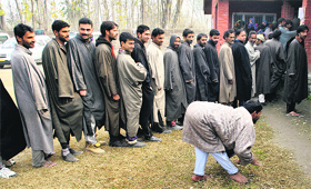 A physically challenged man goes to vote on Tuesday.