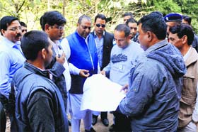 Mayor Vinod Chamoli inspects the disputed area of the Pacific Hills Apartment in Dehradun on Tuesday