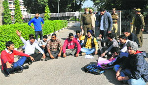 Students hold a protest in front of the Vice-Chancellor's office at Panjab University in Chandigarh on Wednesday